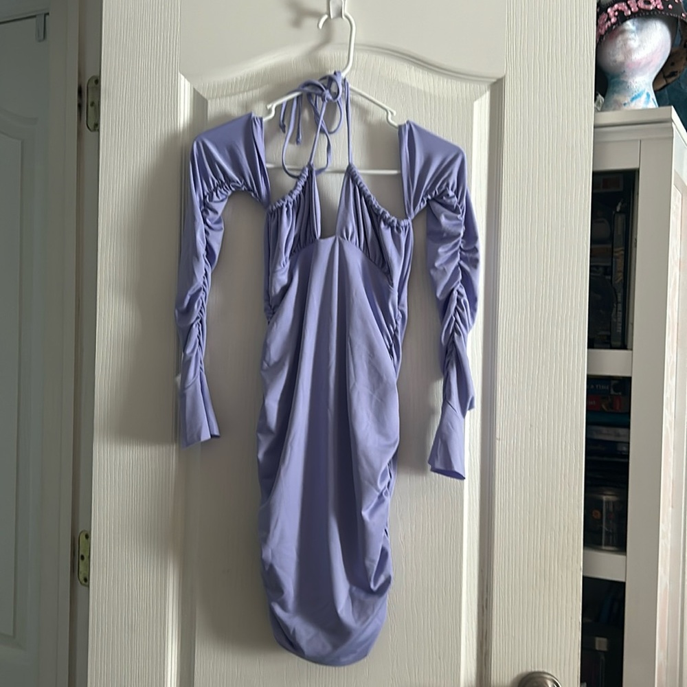 Purple dress, has sleeve but shoulder-less